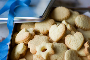 group of pastry biscuits in a metal box