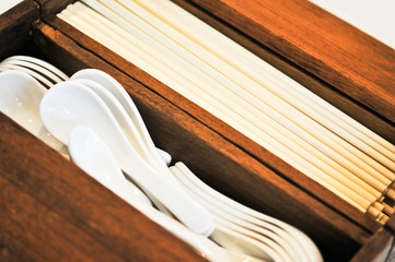 Soup spoons and chopsticks in wooden case