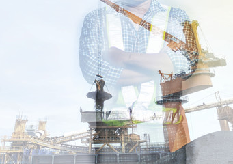 worker crossed his hands with Industrial floating crane double exposure concept