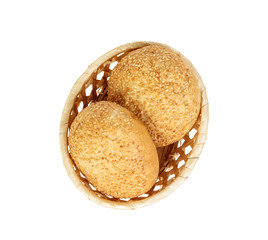 Tasty basket with bun bread on white background isolated. Delicious assorted bagels. top view