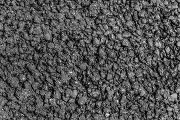 Top view of new grainy asphalt, road surface.