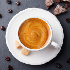 Coffee espresso in white cup. Top view
