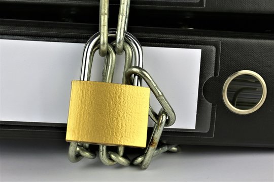 An concept Image of a Folder with chains and a lock