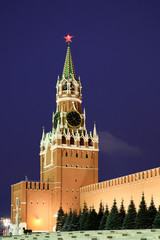 Fototapeta na wymiar Kremlin tower with star and large clock.