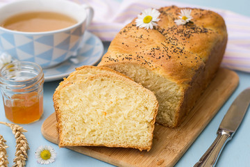 Braided white bread brioche challah with poppy seeds