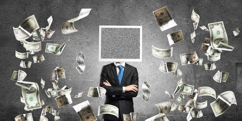 Businessman with monitor instead of head.