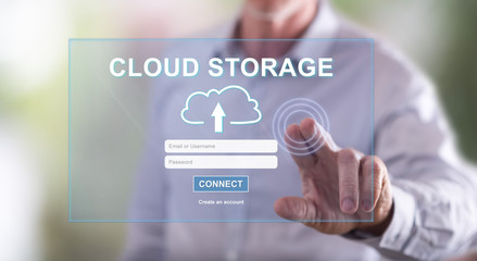 Man touching a cloud storage concept on a touch screen