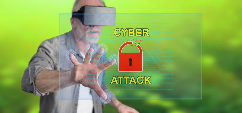 Man wearing a reality virtual headset touching a cyber attack concept on a touch screen