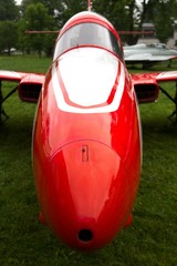 Red - white acrobatic jet plane