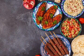 Classic kebabs, tabbouleh salad, baba ganush and baked eggplant with sauce.