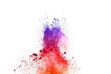 Obraz premium Colorful powder explosion on white background.