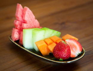 Fruit plate Fresh organic fruit salad on a plate