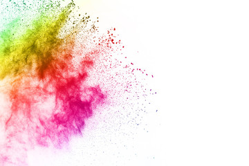 Explosion of colored powder on white background.