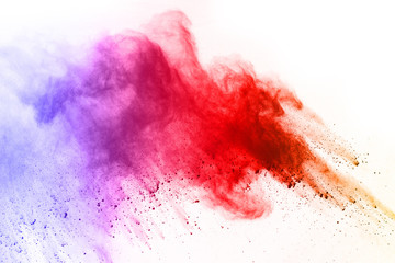 Explosion of colored powder on white background.
