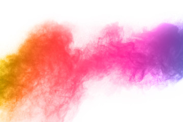 abstract powder splatted background. Colorful powder explosion on white background. Colored cloud. Colorful dust explode. Paint Holi.