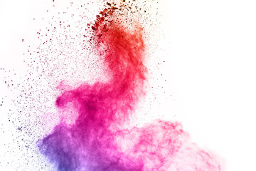 abstract powder splatted background. Colorful powder explosion on white background. Colored cloud. Colorful dust explode. Paint Holi.