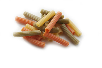 Variegated italian pasta isolated on white background. Colorful dried pasta