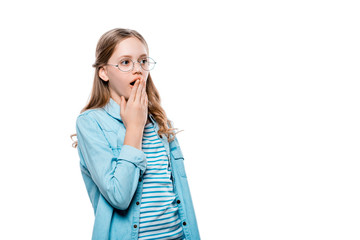 shocked teenage girl in eyeglasses looking away isolated on white