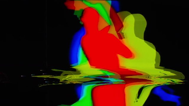 a skillful male dancer dancing in a contemporary style. this series is a shadow dancer silhouette. this version has been further manipulated with a video distortion effects unit