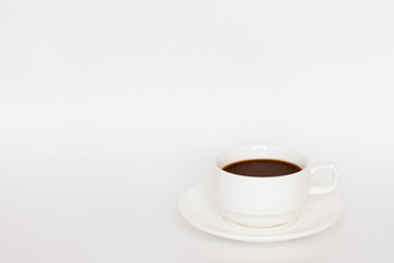 Coffee cup with saucer on white background. Copy space. Coffee break concept.
