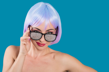 Flirting woman in glamour glasses