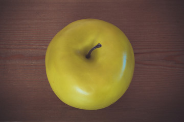 Green apple on a wooden background