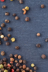 Top view on allspice seeds isolated on dark background