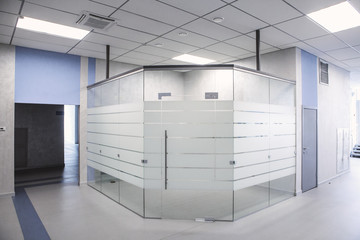 Modern office interior. Glass partition