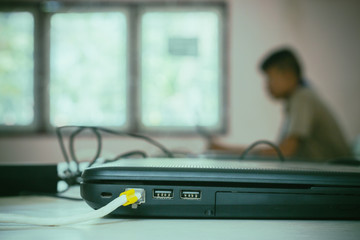 Students are learning by computer.