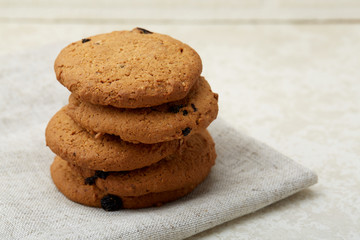 Chocolate chips cookies isolated on light background, macro, close-up