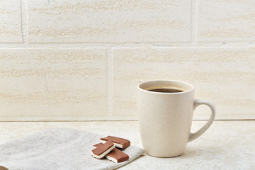 Cup of coffee and chocolate isolated on the white background.