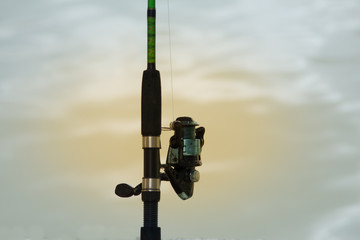 The fishing reel.