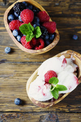 Fresh fruit ice cream with mint on the wooden background