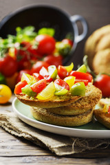 Traditional italian bread frisella with tomatos