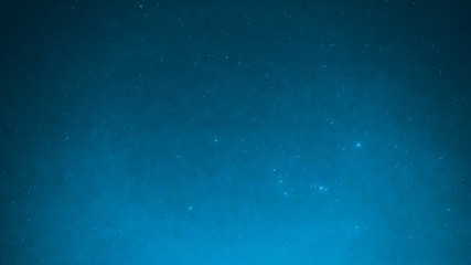 blue background from night sky with bright small star and special seeing gemini meteor from...