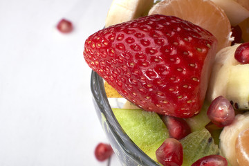 fruit salad vitamin strawberry kiwi pomegranate