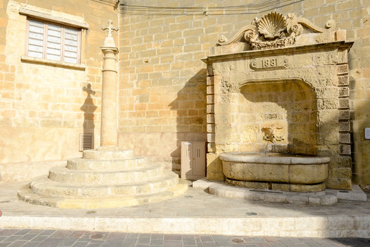 Old fountain in center of Victoria on Gozo island
