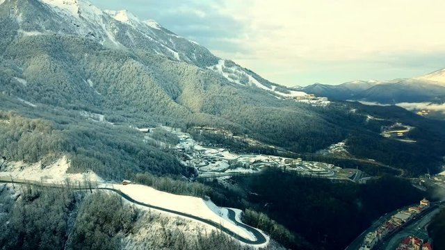 top down view if the mountain valley above the clouds.