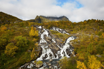 Fototapeta na wymiar Lofoten waterfall on Moskenesoya, Lofoten, Norway