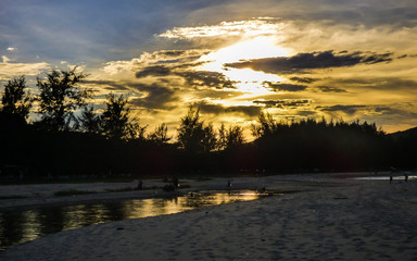 Dramatic sunset at Samila beach in Songkhla, Thailand