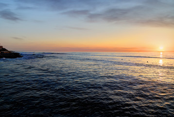 The Sunset over the Pacific Ocean from Ocean Beach near San Diego, California.