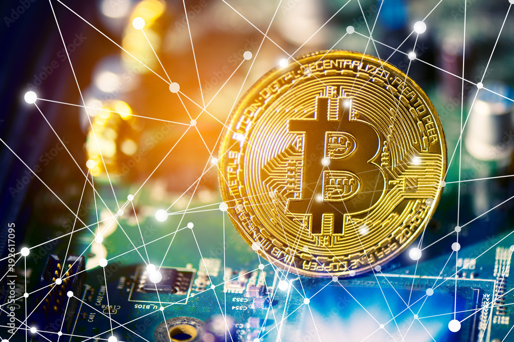 Poster bitcoin on electronic circuit board. cryptography and electronic money concept. currency trading and