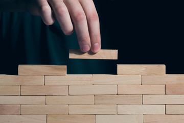 Construction concept Wooden puzzles