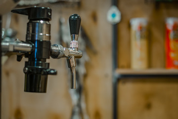 Fototapeta na wymiar Beer pub. Apparatus for pouring beer.