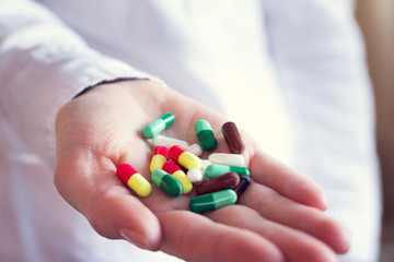 pills capsules in a doctor's hand