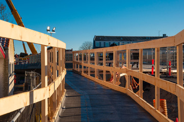 Temporary walking bridge on a construction site