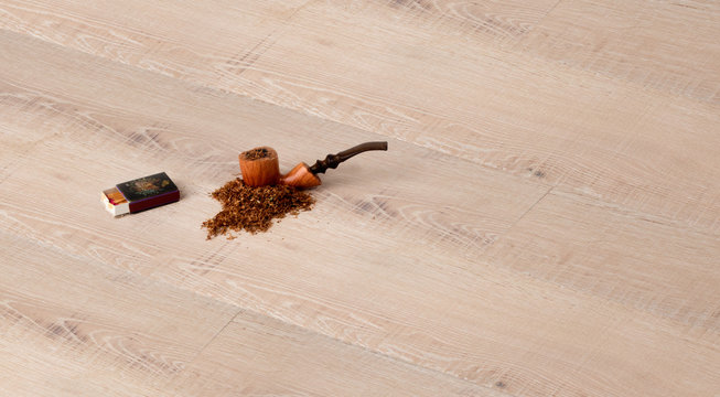 Parquet con pipa e tabacco