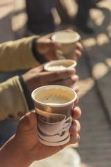 background of hand holding paper coffee cup, fresh morning.