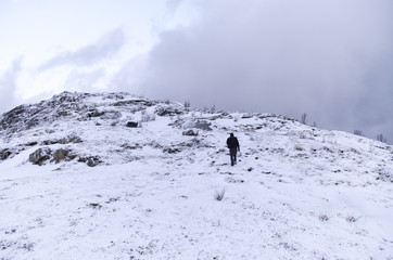 Walking up a Snow Covered Mountain