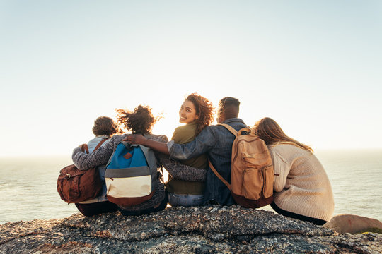 Woman With Friends Enjoying A Day Outdoors